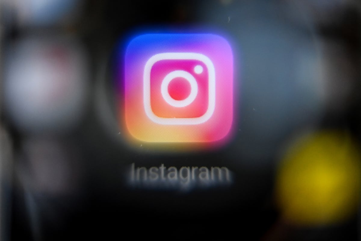 A picture taken on October 12, 2021 in Moscow shows the US social network Instagram's logo on a smartphone screen. (Photo by Kirill KUDRYAVTSEV / AFP)