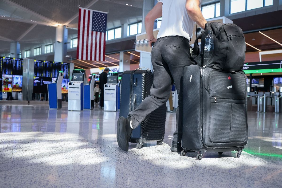 Travelers at Newark Liberty International Airport in Newark, New Jersey.