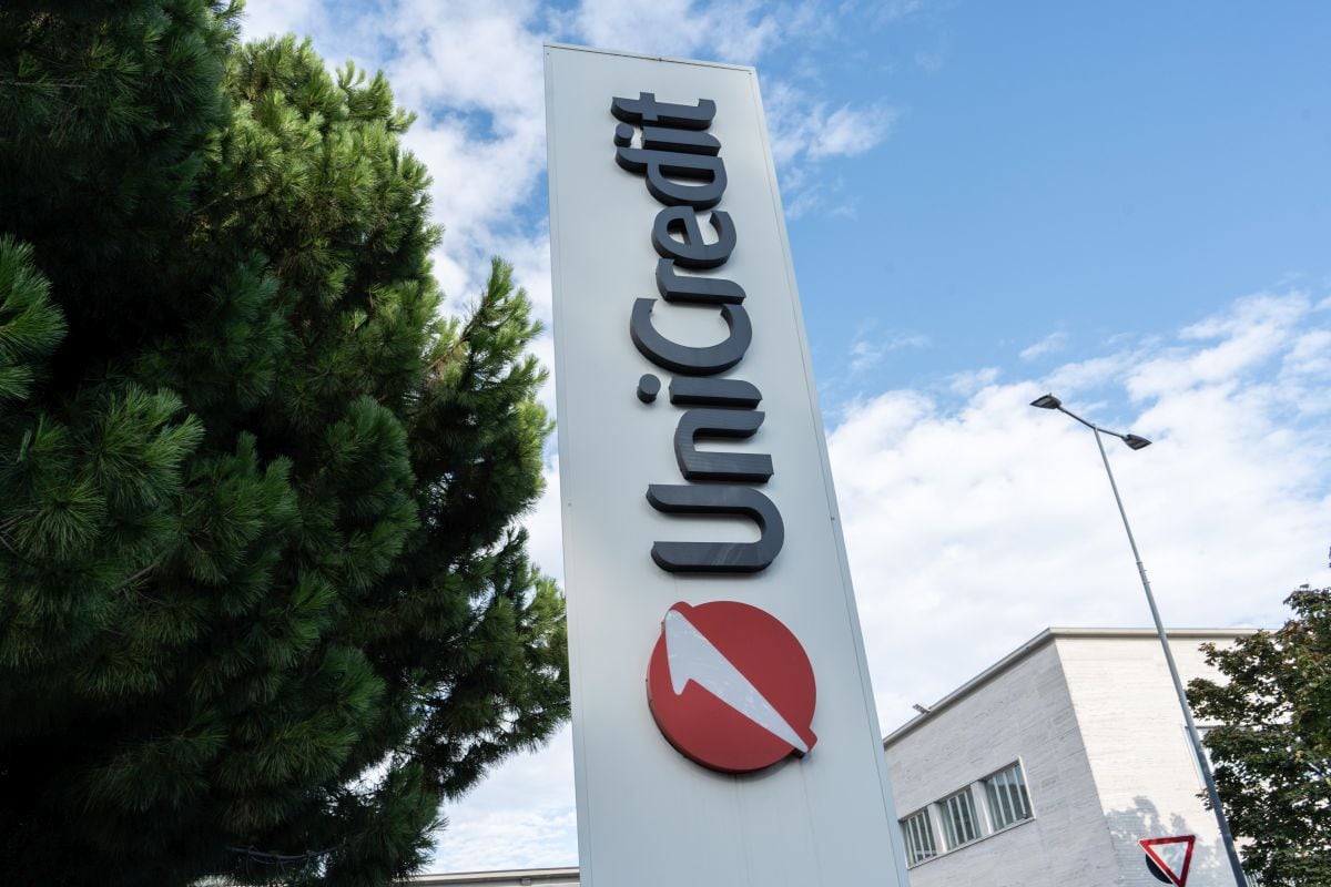 A logo outside a UniCredit SpA bank branch in Brescia, Italy, on Tuesday, Aug. 8, 2023. Italian stocks tumbled after a surprise new tax on bank profits sent the country's lenders tumbling, erasing as much as 9.5 billion ($10.4 billion) from their combined market capitalization. Photographer: Francesca Volpi/Bloomberg
