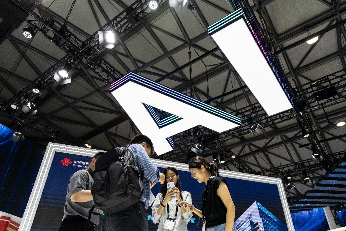 Signage for artificial intelligence. Photographer: Qilai Shen/Bloomberg