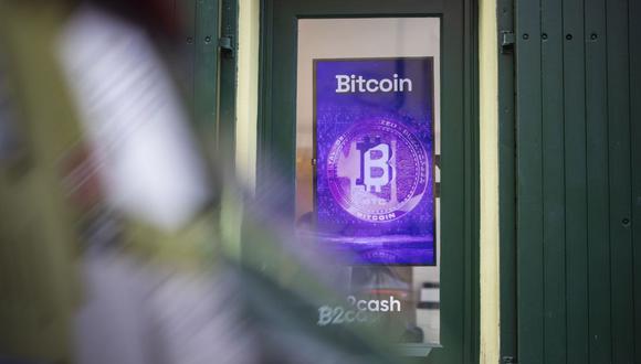 A Bitcoin logo in the window of a cryptocurrency exchange office in Prague, Czech Republic, on Friday, Jan. 5, 2024. Bitcoin has been on a tear ahead of an upcoming Jan. 10 deadline that could see the US Securities and Exchange Commission approve the first exchange-traded fund tied directly to the assets spot price. Photographer: Milan Jaros/Bloomberg