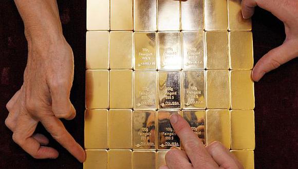 El oro al contado bajaba 0.1% a US$1,246.82 la onza este lunes.&nbsp;(Foto: AFP)
