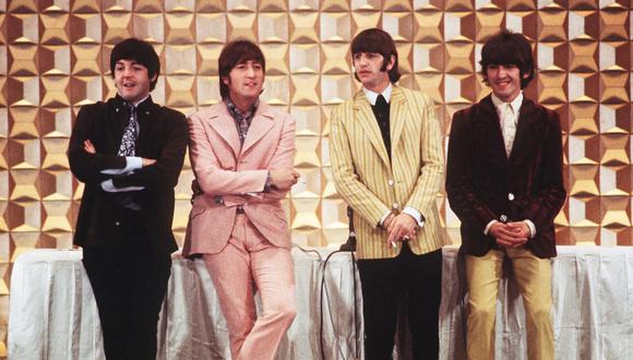 De izquierda a derecha aparecen Paul McCartney, John Lennon, Ringo Starr y George Harrison durante una conferencia de prensa en Tokio. (Foto: JIJI PRESS / AFP)