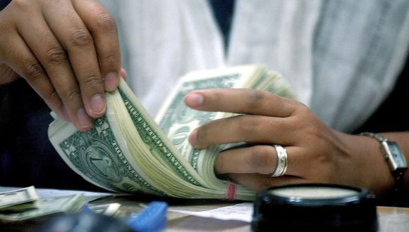 El dólar acumula una ganancia de 13.18% en el mercado cambiario en lo que va del 2021. (Foto: AFP)