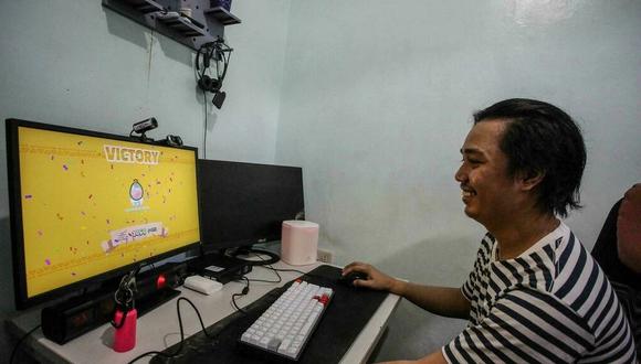 Axie Infinity es un videojuego basado en el blockchain en el que los usuarios ingresan por jugar y cuya popularidad se ha disparado en países como Filipinas. (Foto: AFP)