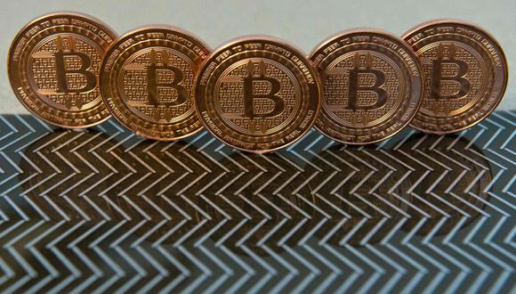Conozca en la siguiente nota todo lo que tiene que saber sobre el Bitcoin, la criptomoneda más popular del mercado. (Foto: AFP)