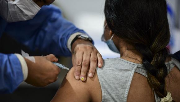 El Minsa aprobó una serie de medidas para la vigilancia, prevención y control de la salud de los trabajadores en medio de la pandemia del COVID-19. (Foto: AFP)