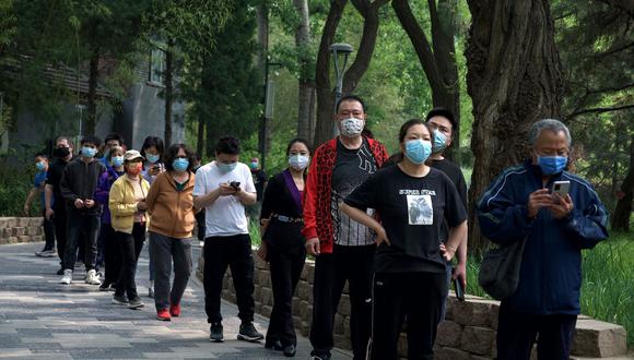 La notificación se produjo después de que la OMS pidiera a China información detallada sobre el reciente incremento en casos de enfermedades respiratorias. (Foto: AFP)